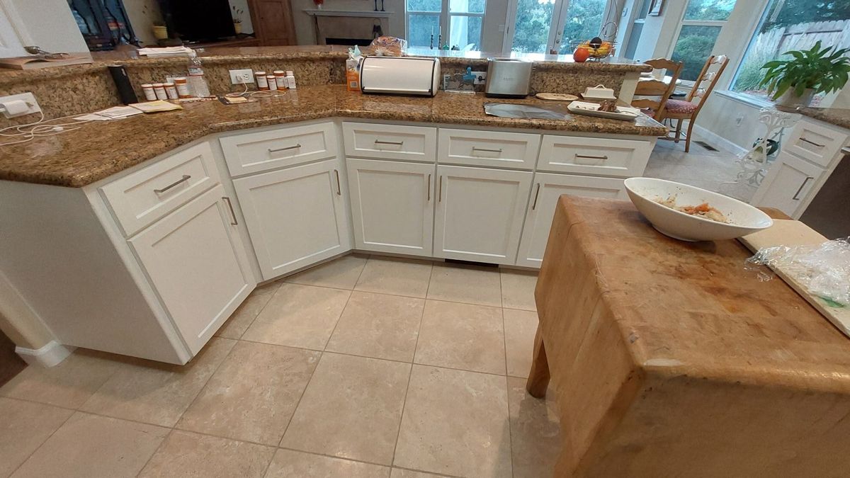 Project 9 — cabinet painting and staining by Rafael's Painting Inc.