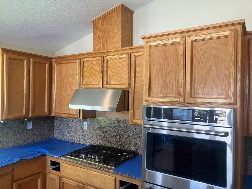 Project 2 — cabinet painting and staining by Rafael's Painting Inc.