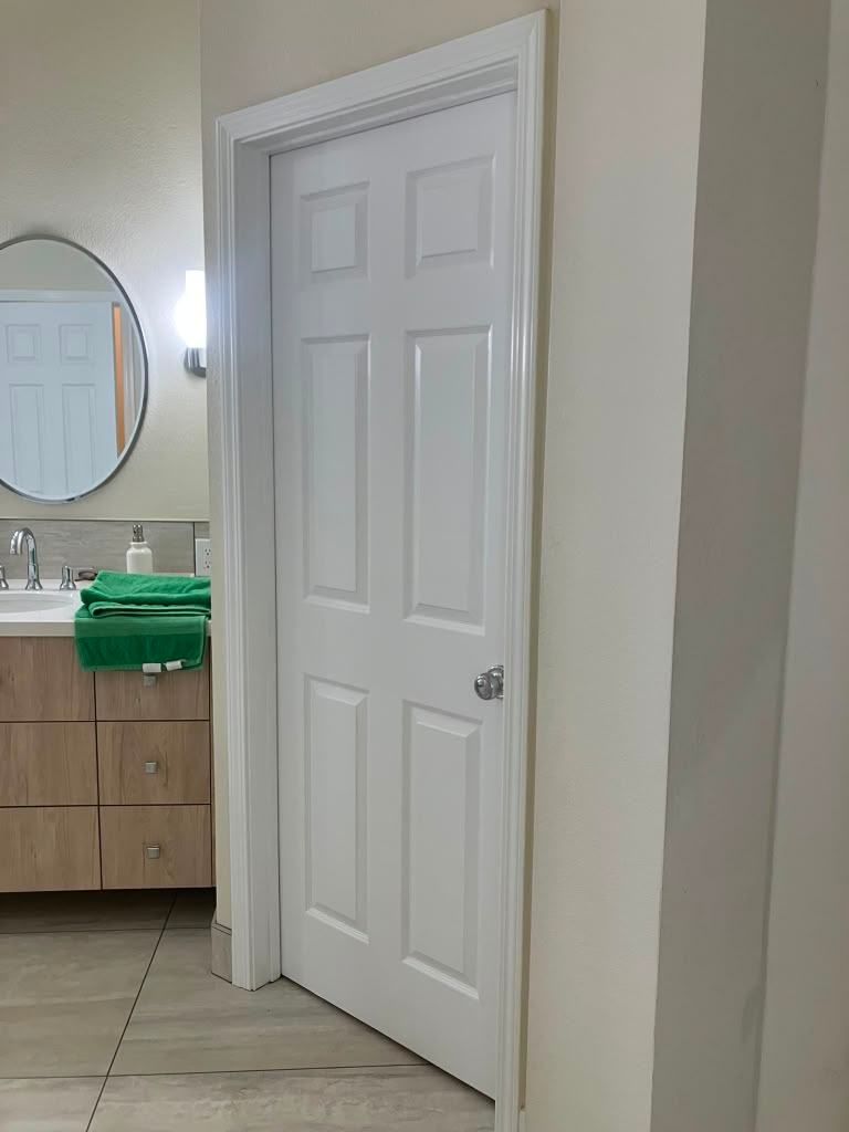 Project 45 — door and trim painting by Rafael's Painting Inc.